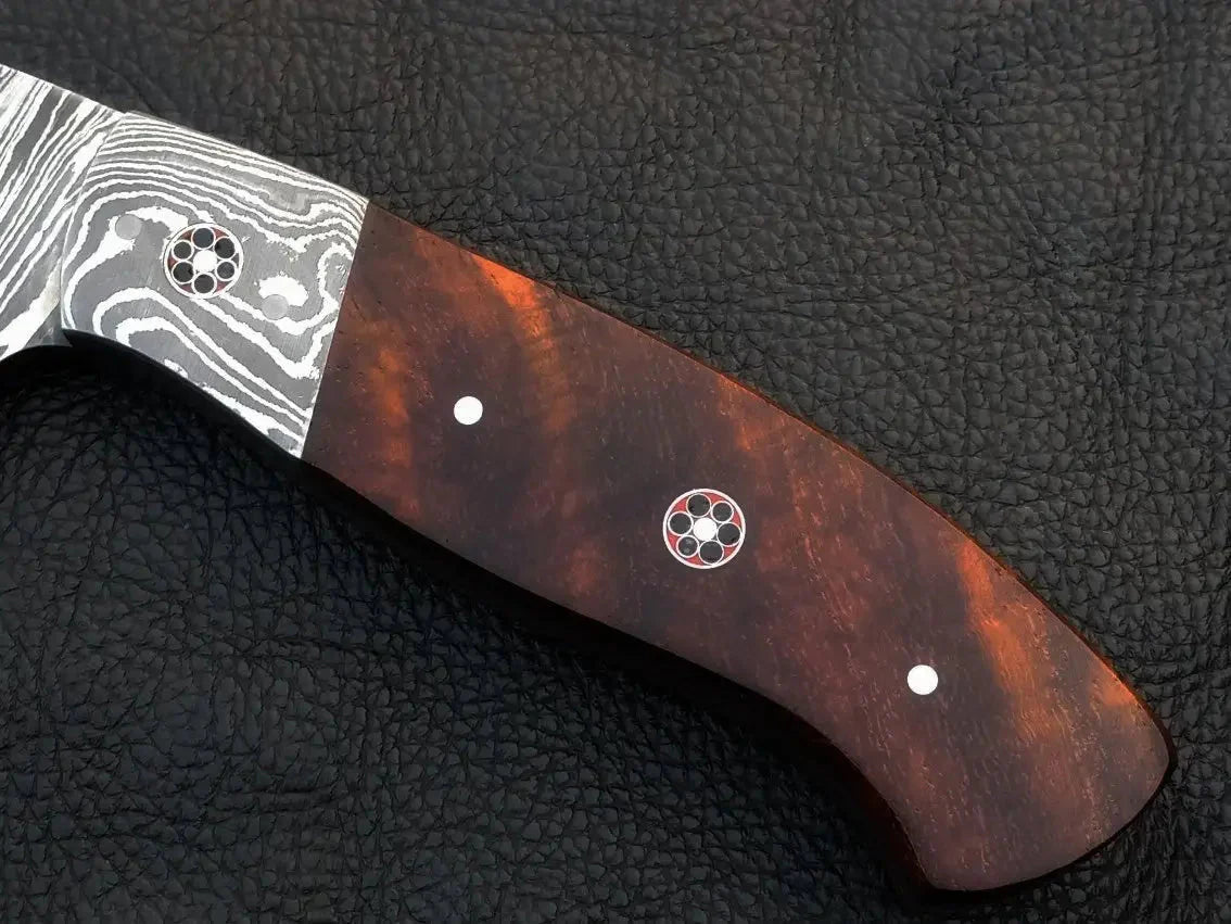 Damascus Steel Hunting Knife-C97 on leather surface with pattern