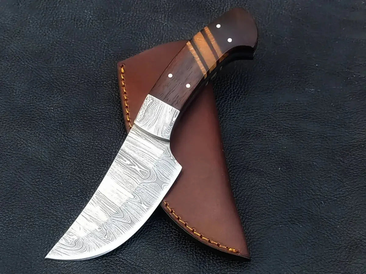 Handmade Damascus steel knife in brown leather sheath