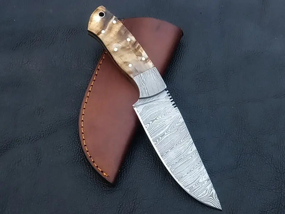 Handmade Damascus Steel Knife - C233 featuring a decorative handle and unique design