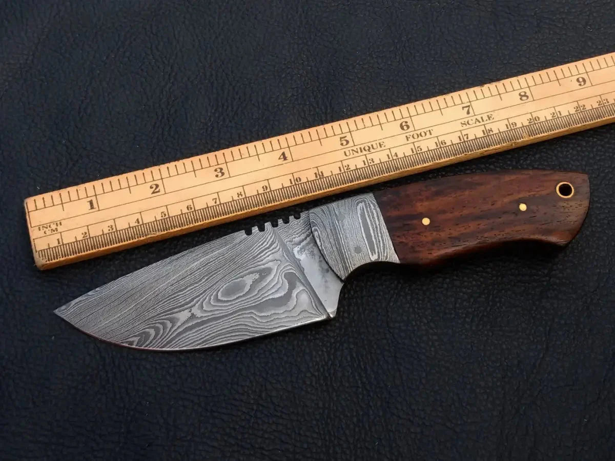 Handmade damascus steel skinning knife with wooden handle and ruler